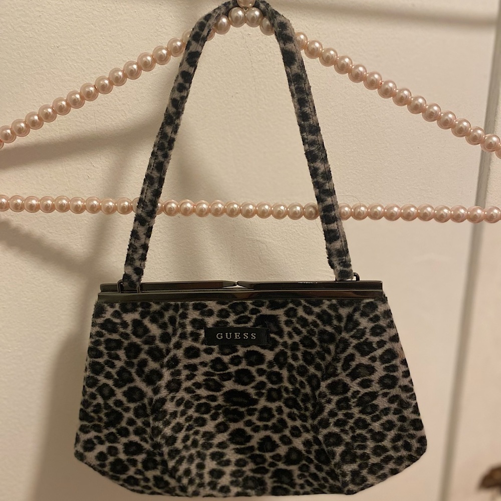 Black and gray leopard print bag